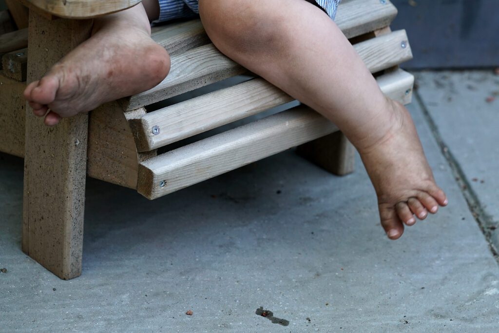 Dirty feet of a young child