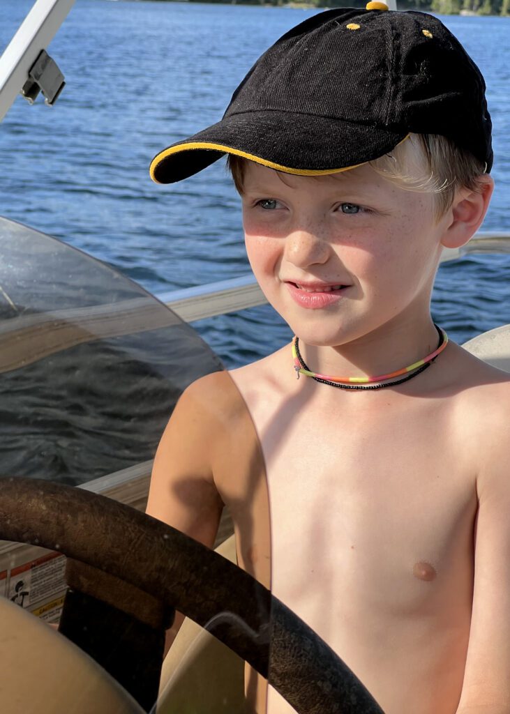 Boy wearing black cap